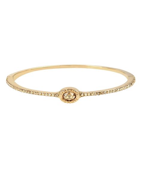 coach signature logo hinged bangle.